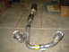 1996 Ford Bronco - An exhaust y-pipe assembly is shown, a flange and two distinct outlet pipes.