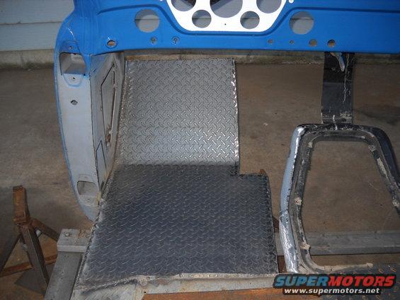 54-build--11092010-011.jpg 11-09-2010:  Then I made a template of the driver side kick panel plate so I'll be able to match it on the passenger side.

Then I pulled out the driver side floor and finished all the trimming with a grinder with a cut off wheel. 

Then I started tacking it in place. Once it was tacked in I did some more welding. I also started welding the rear drop down panel in. Man my welds look like crap! x_x  :lol:  That's what I get for not welding in over a year. It's a good thing I've got 8 grinders! I may need them all to clean up these welds! =))   I ran out of day light. So I had to call it quits for the day. Weather permitting I'm hoping to finish up the welding/grinding tomorrow.
