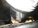 1996 Ford Bronco - This photo shows a close-up view of a chrome exhaust pipe tip, likely from the underside of a vehicle.