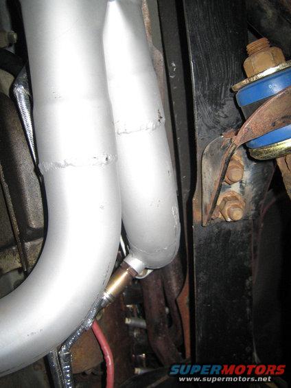 Exhaust manifold pipes with oxygen sensor and suspension component