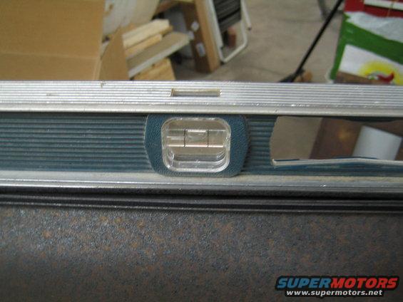 Spirit level showing bubble centered between lines