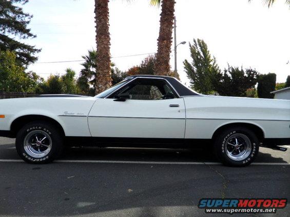 1973 Ford Ranchero side view, white with black trim and vinyl roof