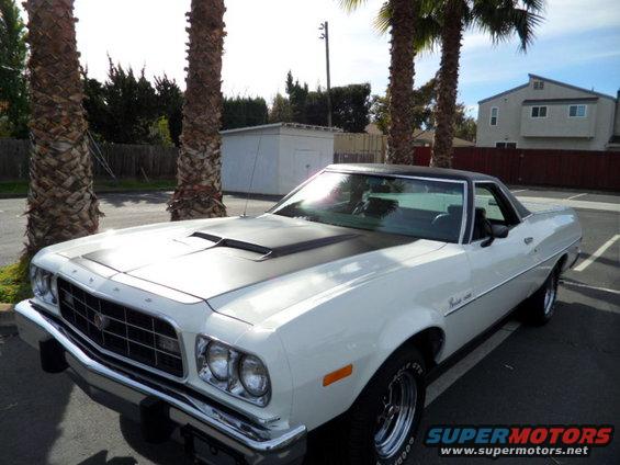White 1973 Ford Ranchero with black hood stripe, 3q-front view