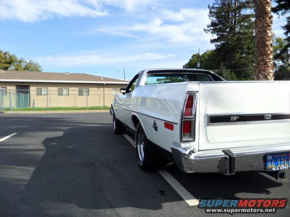 1973 Ford Ranchero rear view, white with black trim, parked in lot