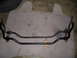 1973 Ford Ranchero - Two automotive sway bars are shown side-by-side on a mat, possibly for comparison or replacement.