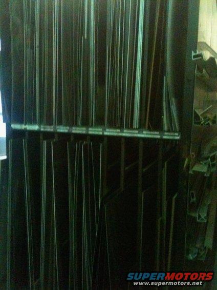 Metal trim pieces stored vertically