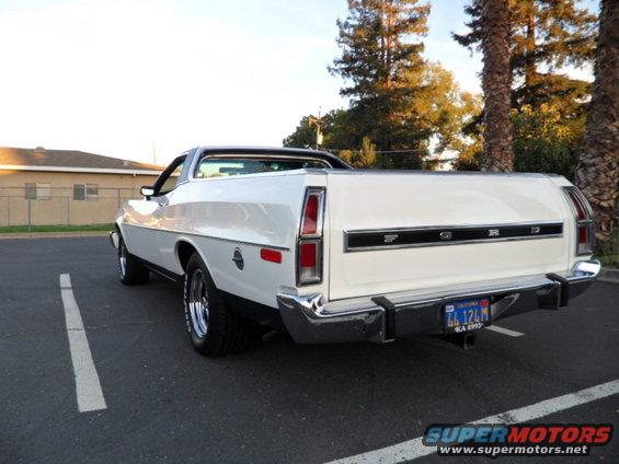 1973 Ford Ranchero parked in a lot, rear view showing tailgate and bumper