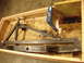 1989 Ford Bronco - Custom rear bumper assembly and a red taillight are packed in a wooden crate.