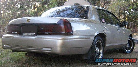 Tan 2000 Mercury Grand Marquis rear view