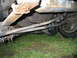 1984 Ford Bronco - Undercarriage view of a 1984 Ford Bronco, highlighting its suspension and drivetrain components.