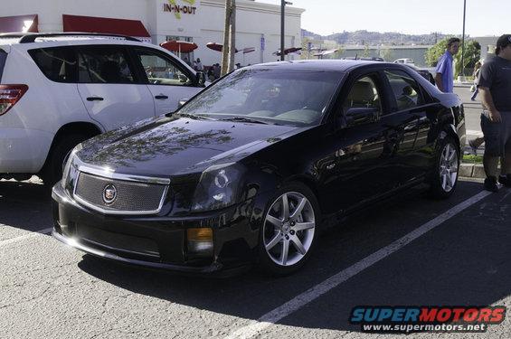 Black 2006 Cadillac STS sedan, 3/4 front view