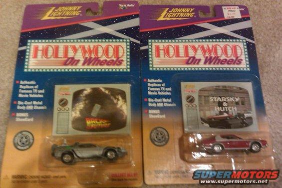 Two Johnny Lightning "Hollywood on Wheels" toy car packages, one a Back to the Future car and the other a Starsky & Hutch car
