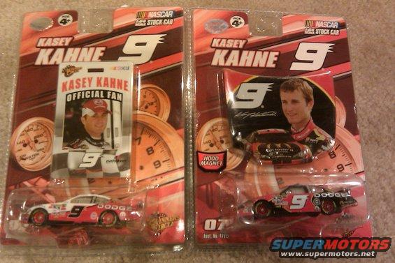 Two Kasey Kahne NASCAR stock car models, one with official fan badge