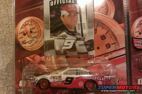 Diecast model of a Dodge race car with driver Kasey Kahne's photo and gauges