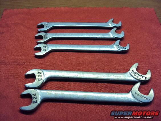 six wrenches on red cloth, some marked Bonney USA