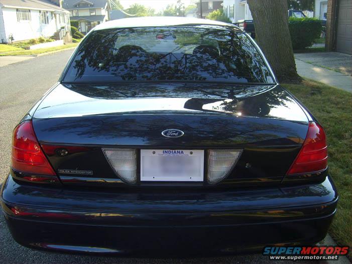 Rear view of a black 2002 Ford Crown Victoria Police Interceptor with an Indiana license plate