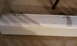 2003 Acura TL - A white car door panel is shown with visible mounting holes and some scuff marks.