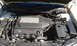 2003 Acura TL - Engine bay view of a V6 VTEC engine with Acura branding.