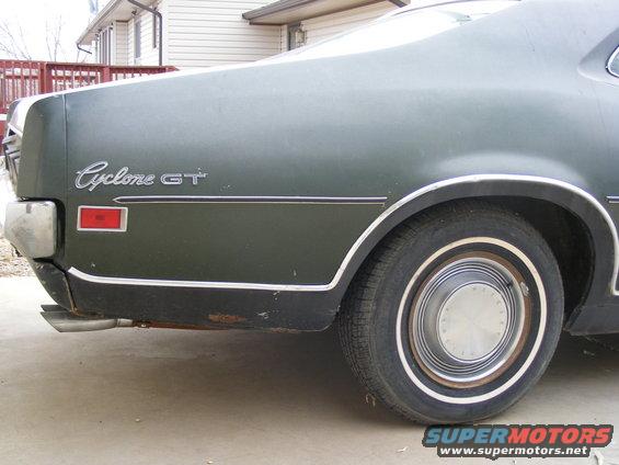 1971 Mercury Cyclone GT rear quarter panel with dual exhaust pipes