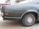 1971 Mercury Cyclone - The rear quarter panel of a 1971 Mercury Cyclone GT shows the distinctive badging and dual exhaust pipes.