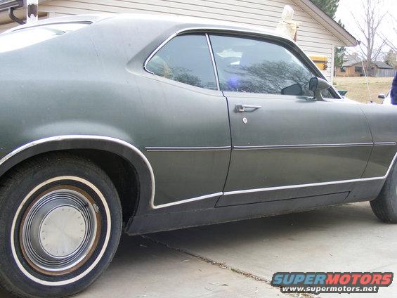 1971 Mercury Cyclone side profile, dark green paint, chrome trim