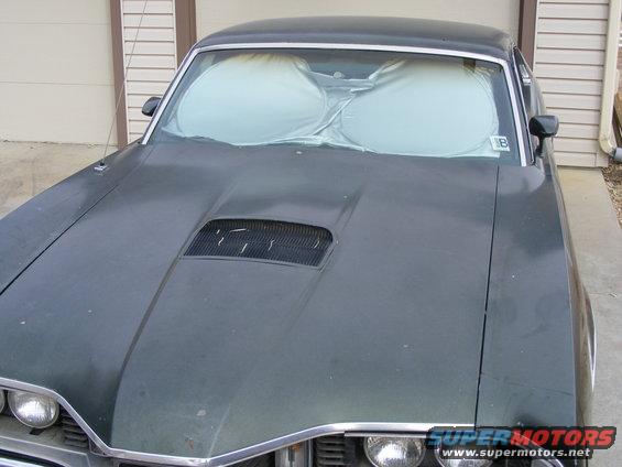 1971 Mercury Cyclone front view with sunshades on windshield and hood scoop