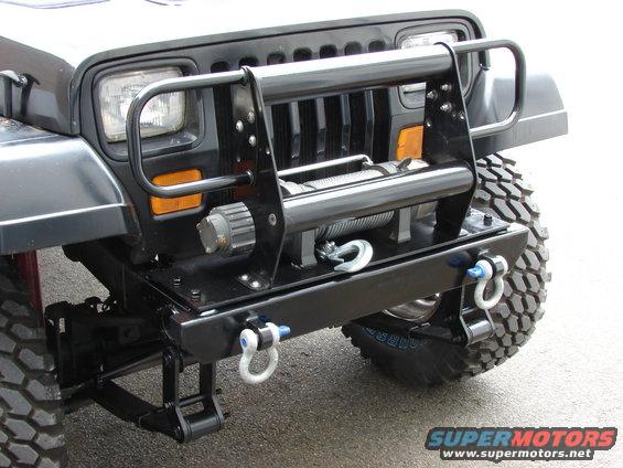 Front view of a 1993 Jeep YJ with a winch mounted on the bumper
