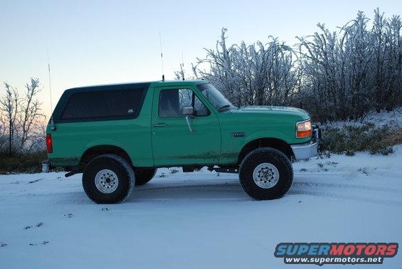 1996 Ford Bronco side view in snow