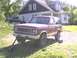 1986 Ford Bronco II - This 1986 Ford Bronco II is parked in front of a house with a jack under the front bumper.