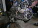 1993 Ford Probe - Engine assembly removed from vehicle, showing internal components and timing belt system.