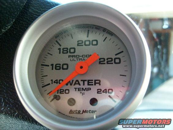 Auto Meter water temperature gauge showing 140 degrees F