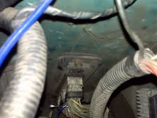 Close-up of vehicle wiring and conduit under the dash