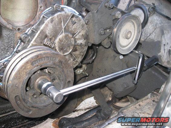 img_3168.jpg After re-tapping the end of the crank, I installed a new timing cover gasket and installed the timing over.  Since I didn't have an alignment tool, I didn't tighten the bolts down.
Torquing the harmonic balancer down centered the timing cover, and after it was fully seated, I then torqued down the remaining timing cover bolts.  Worked very well.