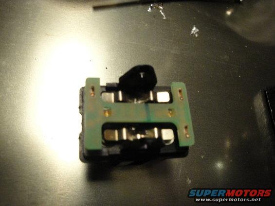 Electrical component with green circuit board and metal contacts