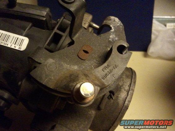 Throttle body part with casting numbers F7UE 9U536-AA