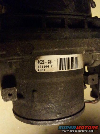 Throttle body part with label 4C2E-DB 031104 2 *20*