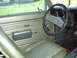 1969 Chevrolet Camaro - The interior of a 1969 Chevrolet Camaro features green upholstery and an SS steering wheel.