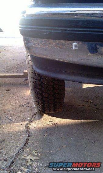 Rear bumper and tire of a 1993 Ford Bronco