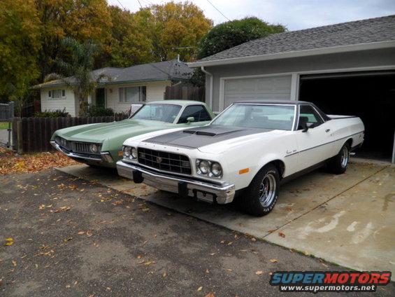 1973 Ford Ranchero parked next to a green Ford Ranchero