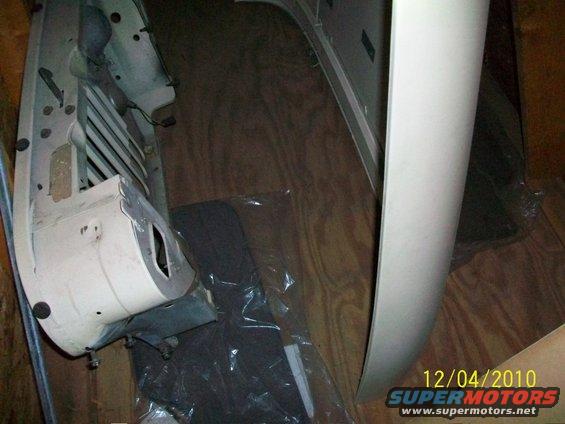 Jeep front fender and grille section in a box