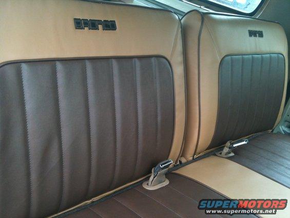 Two-tone brown and tan seats with "BRONCO" badging on the headrests