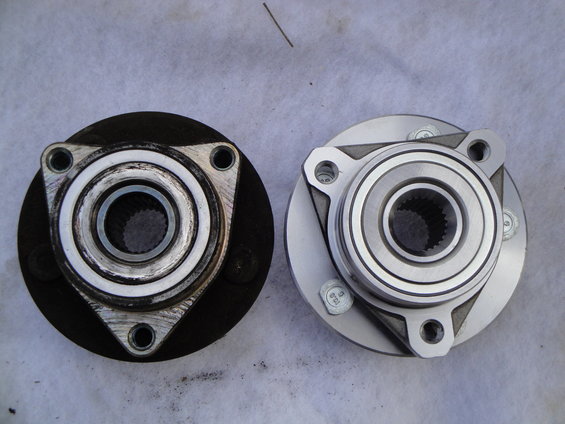 Old and new wheel hub bearings side-by-side
