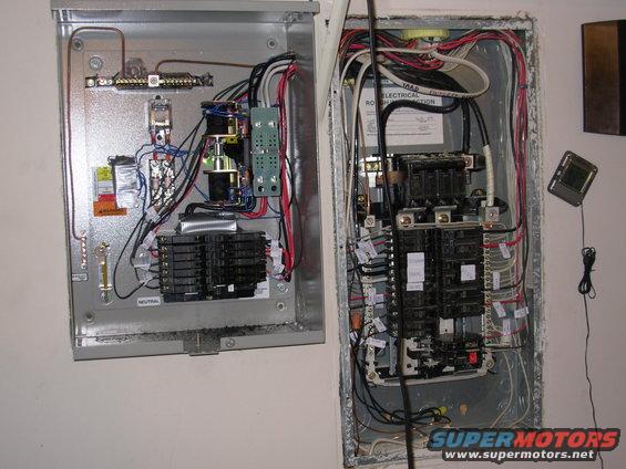 panel1.jpg I added the breaker tray (from a panel I bought separately) to the generator switch box, and moved the original breakers & their wires from the house box.  That's why there are so many empty spaces on the right.