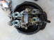 1978 Honda GL1000 - Disassembled motorcycle carburetors are shown in a black drain pan, ready for cleaning or rebuilding.