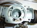 1978 Honda GL1000 - Close-up view of a disassembled carburetor, revealing internal mechanisms and metal construction.