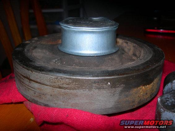 Pulley and hub assembly on red cloth