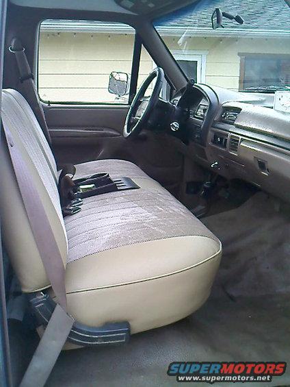 1995 Ford F-150 interior, tan bench seat, dashboard, steering wheel, door panel, seatbelt