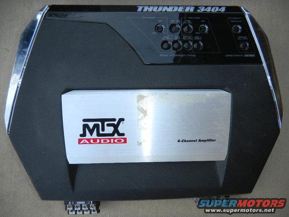 MTX Audio Thunder 3404 4-channel amplifier with various knobs and inputs