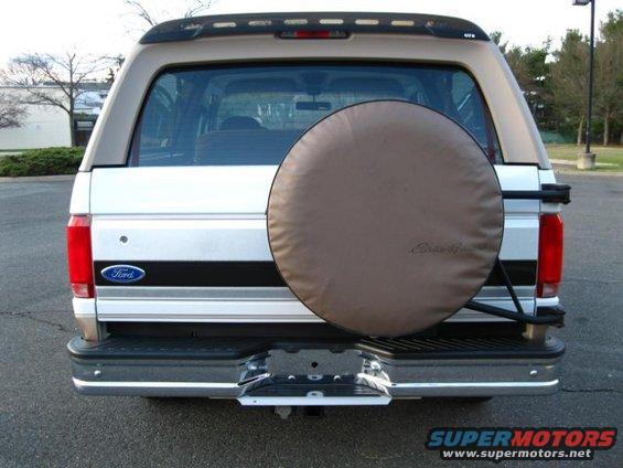 Rear view of a 1996 Ford Bronco with a spare tire cover and a Ford badge