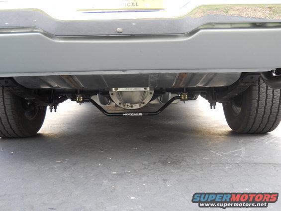 Underside view of a vehicle's rear axle and suspension with a Hotchkis sway bar